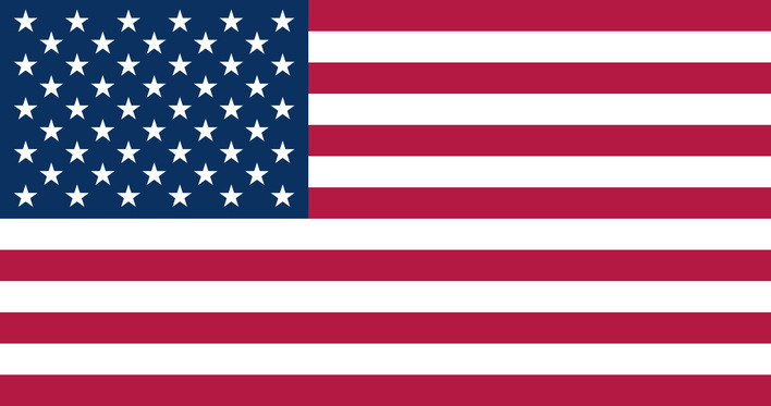 The flag of the United States with 50 white stars and 13 red and white stripes. - © US Department of State