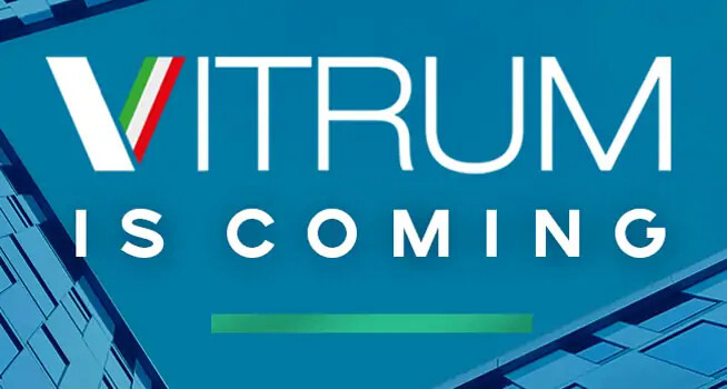 Blaue Grafik mit Text: "VITRUM KOMMT". Das "V" ist rot, grün und blau gestreift. - © Fenzi Group